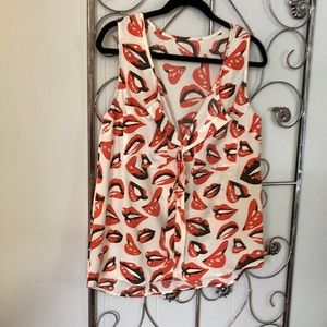 Whimsical “lips” sleeveless blouse.